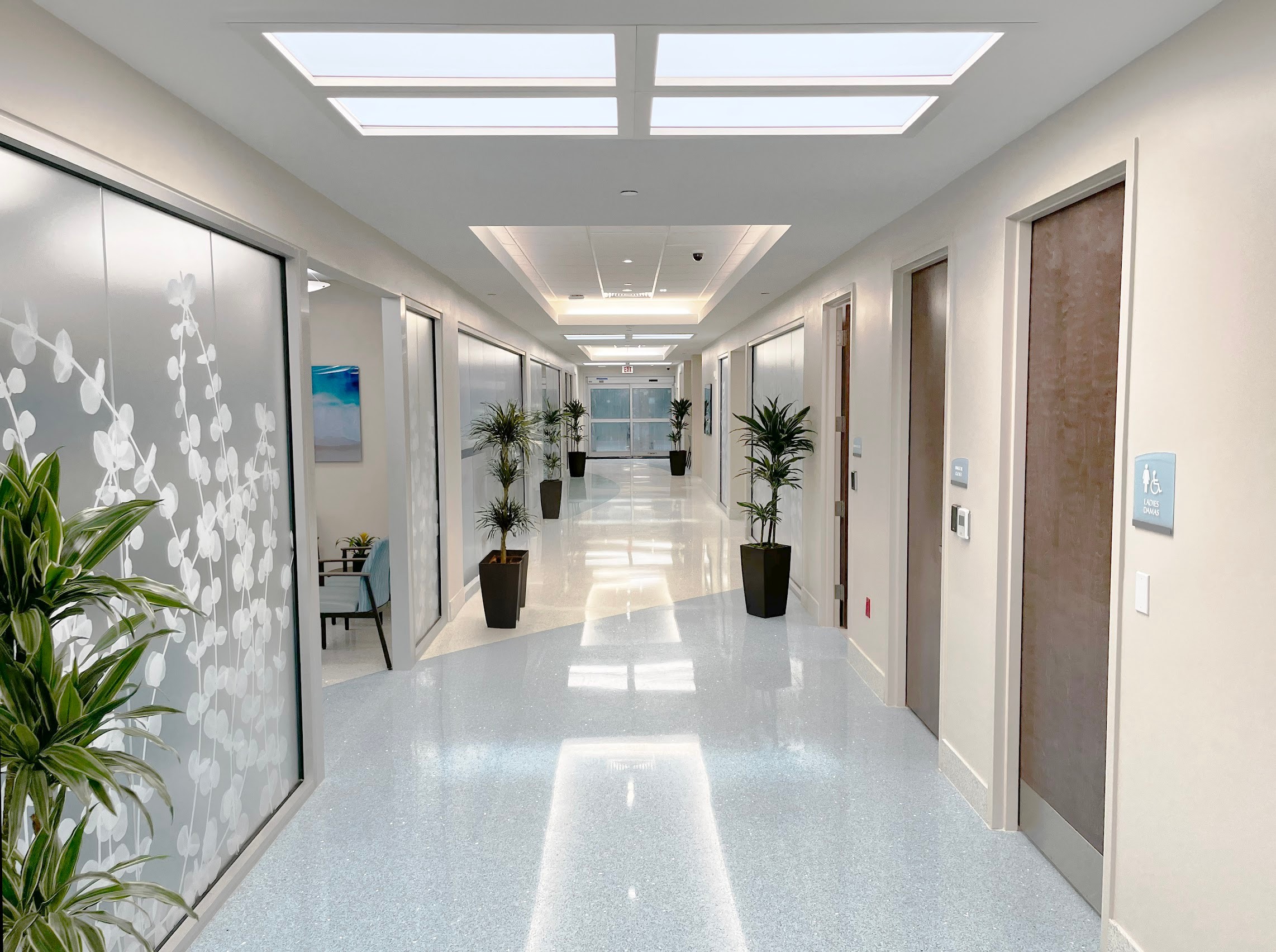 Innerscene Virtual Sun artificial skylight units installed in wall of hallway in Leon Medical Hospital, Miami
