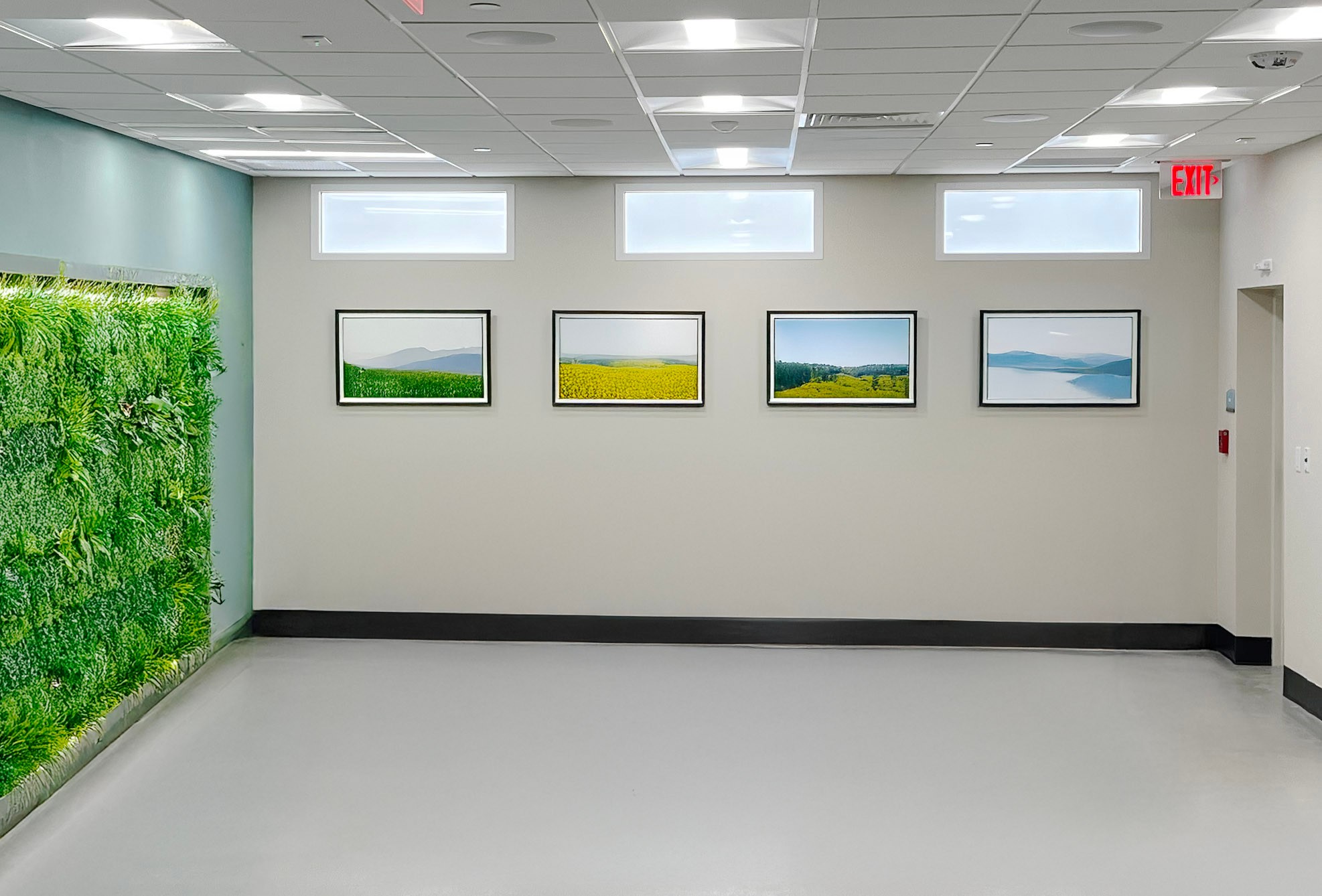 Innerscene Circadian Sky 2x4 artificial skylight units installed in wall of hallway in Leon Medical Hospital, Miami