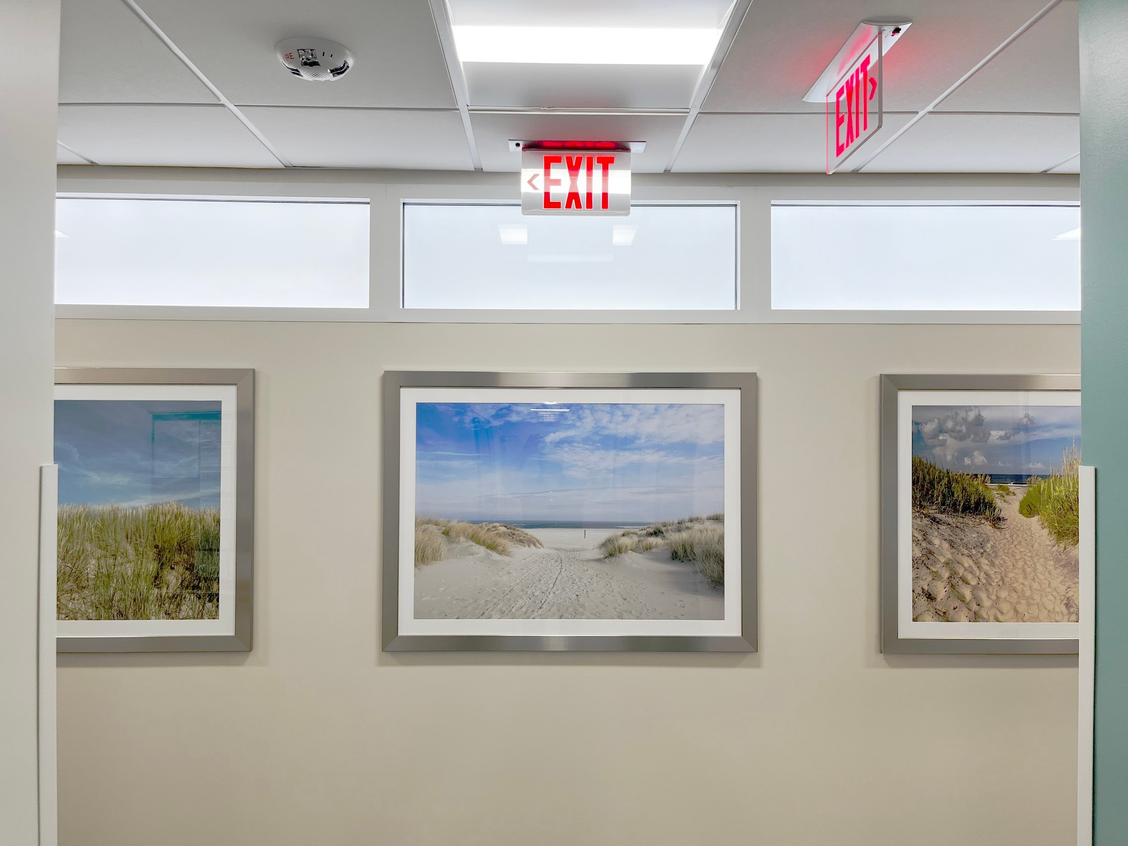 Innerscene Circadian Sky 2x4 artificial skylight units installed in wall of hallway in Leon Medical Hospital, Miami 