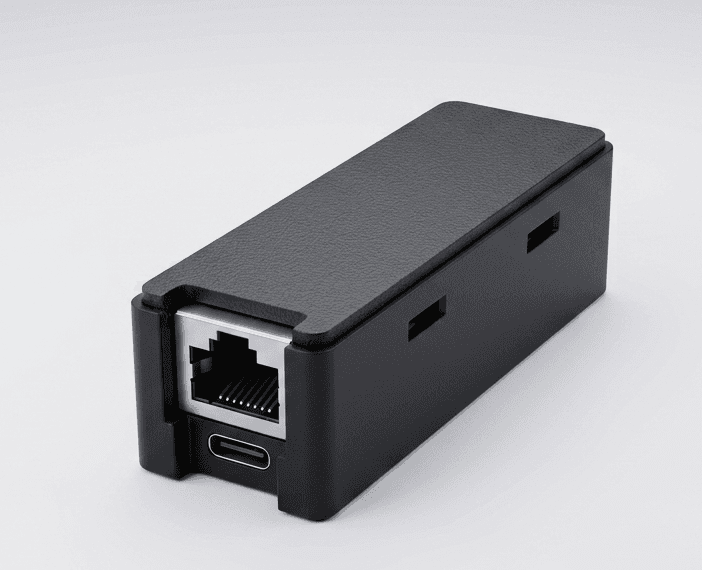 Innerscene Mini Hub wall-mounted with an Ethernet cable, the gateway that ships with every SkySync.